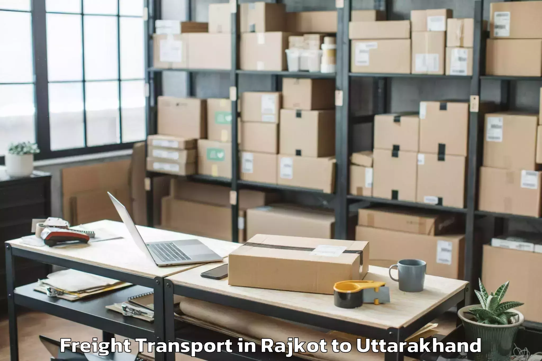 Hassle-Free Rajkot to Dhoomakot Freight Transport